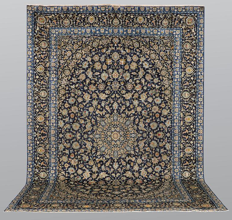 A carpet, Kashan signed, ca 395 x 277 cm.