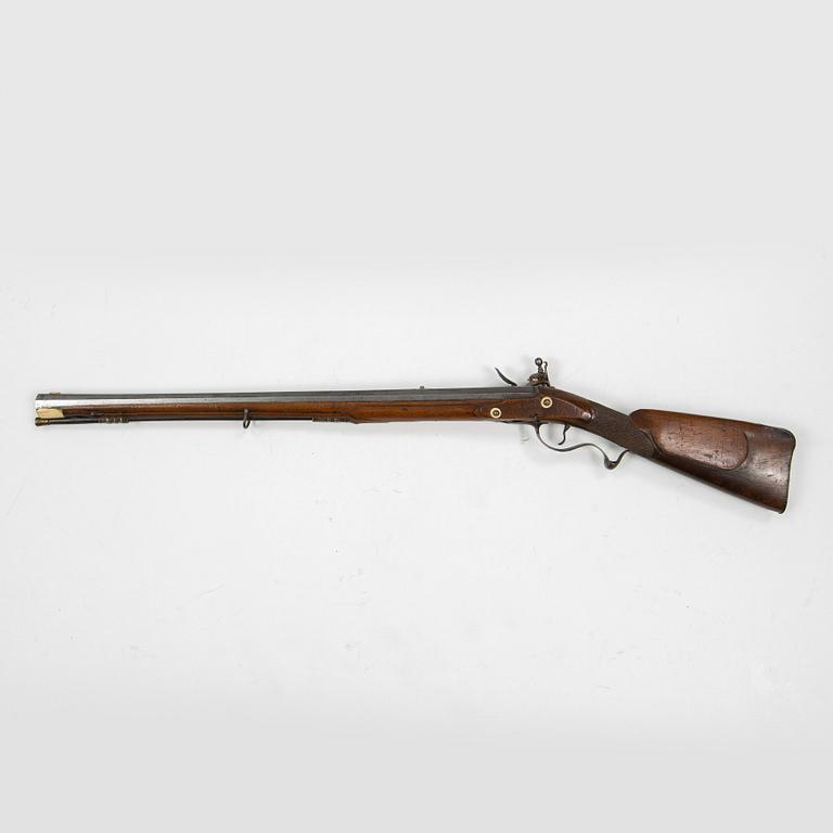 A 18th Century flintlock rifle.