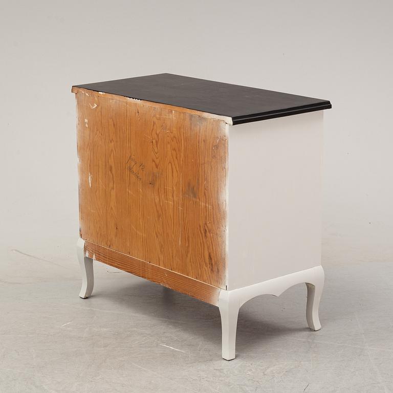 A painted chest of drawers, mid 20th Century.