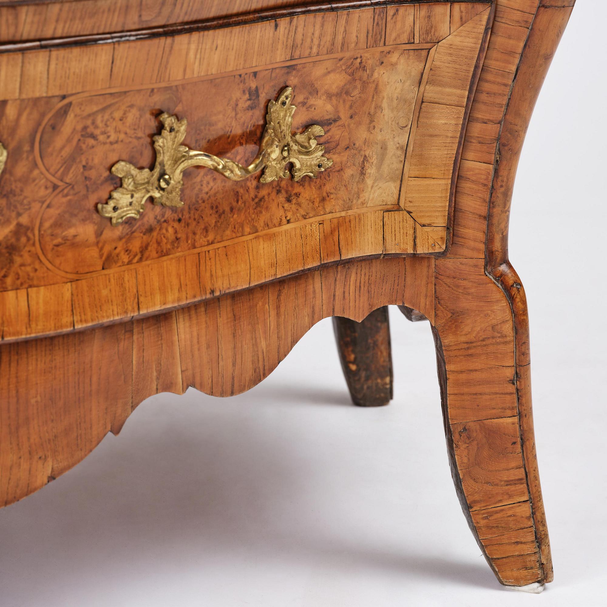 A burr alder parquetry rococo commode, Mälardalen, Sweden, later part 18th century.