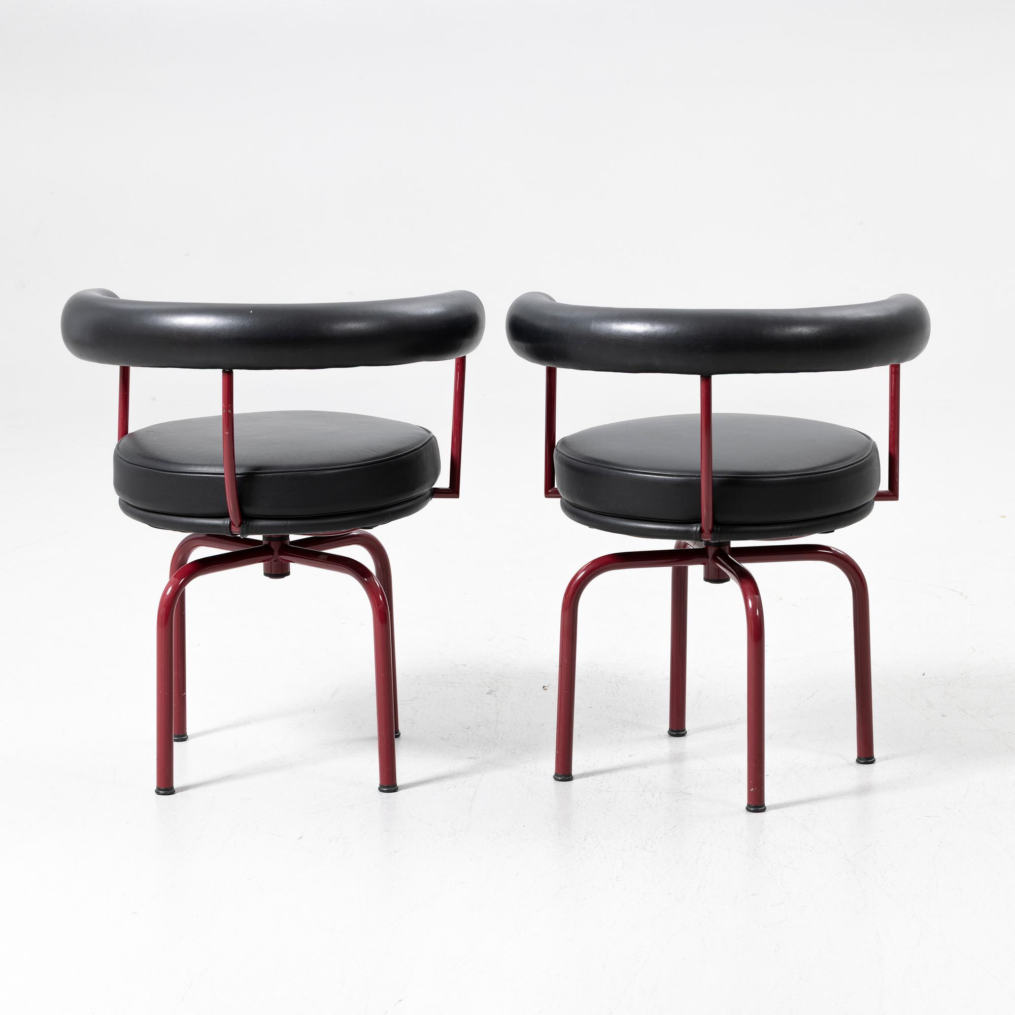 Charlotte Perriand, /Le Corbusier, swivel armchairs, a pair, model LC7, Cassina, Italy, latter half of the 20th century.