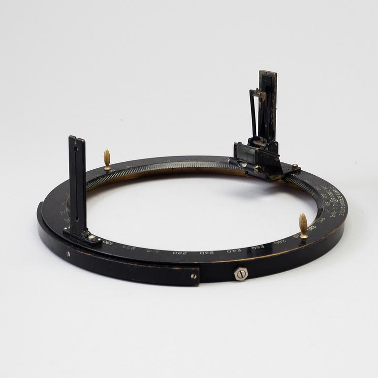 A 20th century Stadimeter and a bearing circle, both in cases. Marked U.S. Navy.