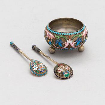 A salt cellar, mark of D. Nikitin, and 2 spoons, poss. P. Abrosimov and M. Andreyevna, enamel, silver. Moscow 1899-1908.