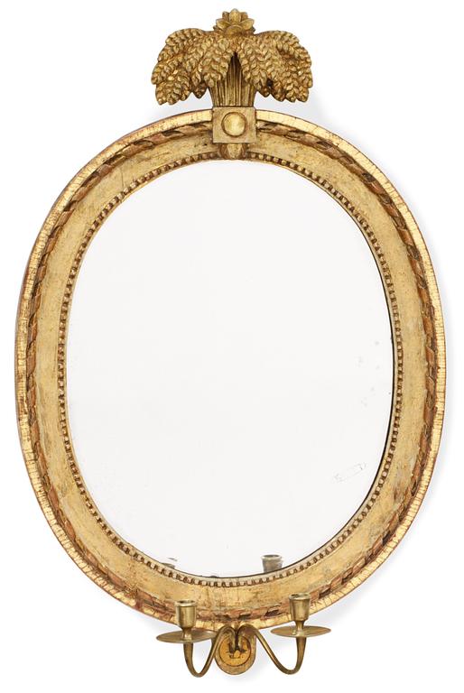 A Gustavian two-light girandole mirror.