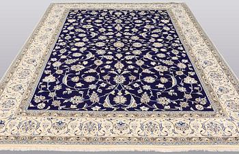 A carpet, Nain part silk, 350 x 250 cm.