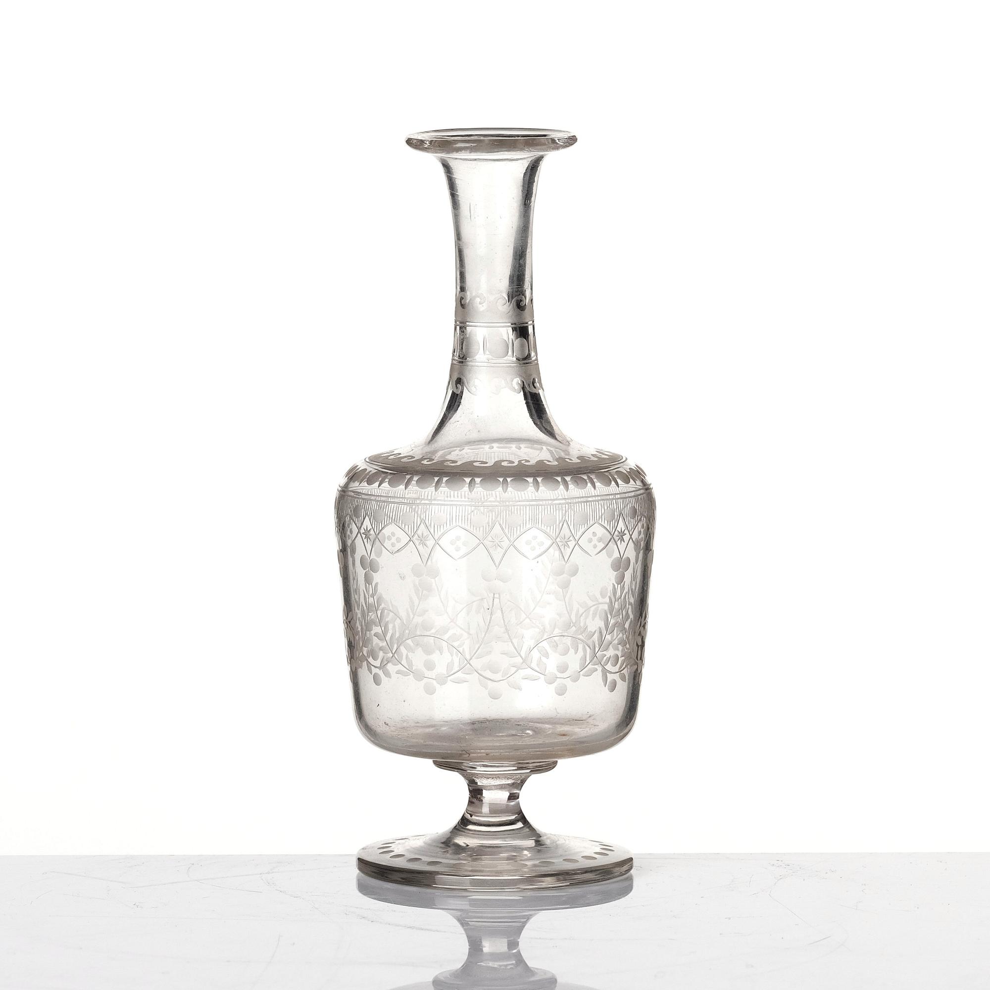 An engraved flask, circa 1800.