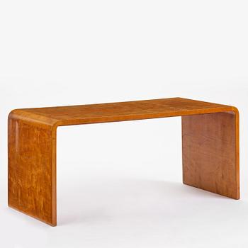 Swedish Modern, a birch veneered coffee table, 1930s-40s.