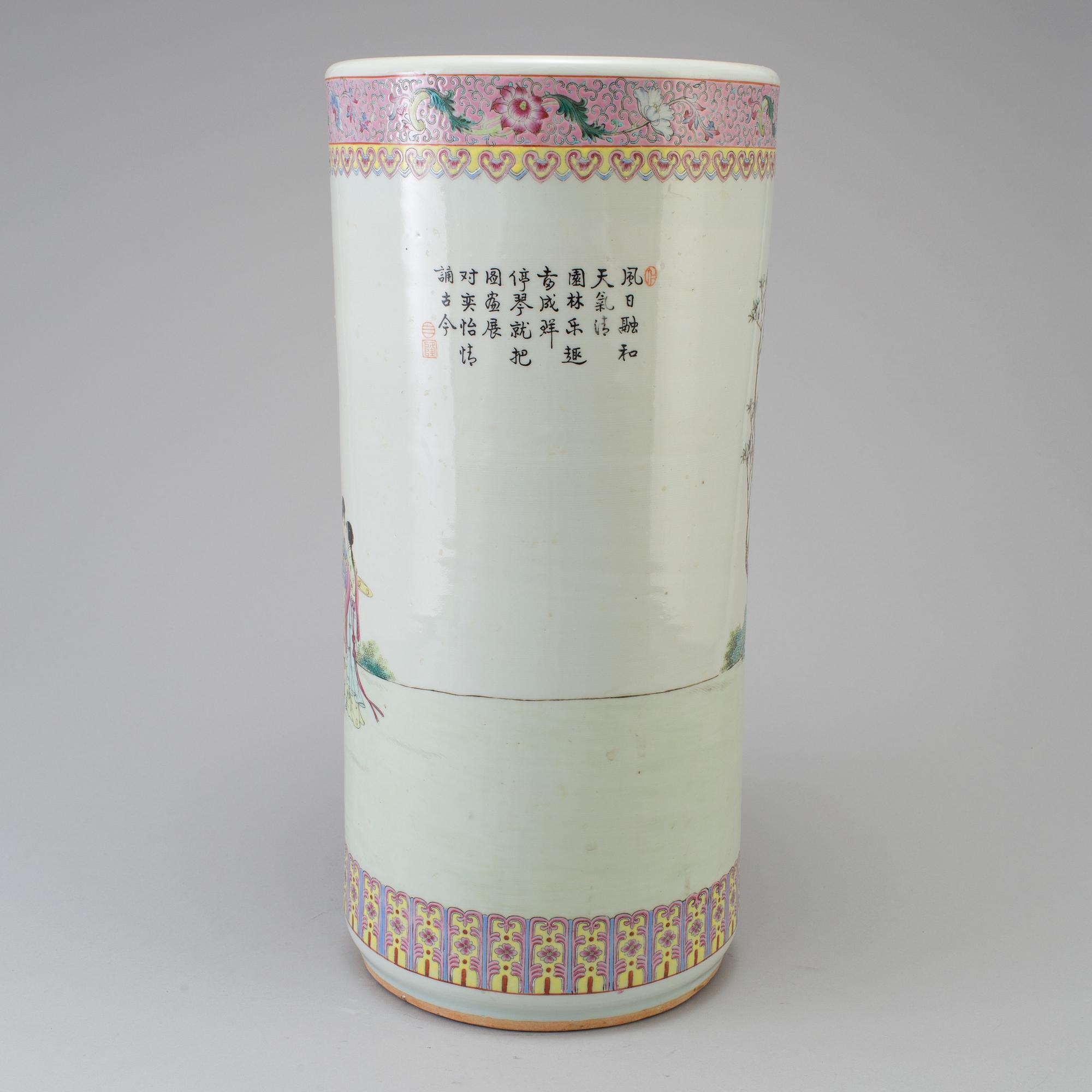A 20th century porcelain umbrella stand.