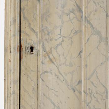 A Swedish column-shaped cabinet 19 th century.