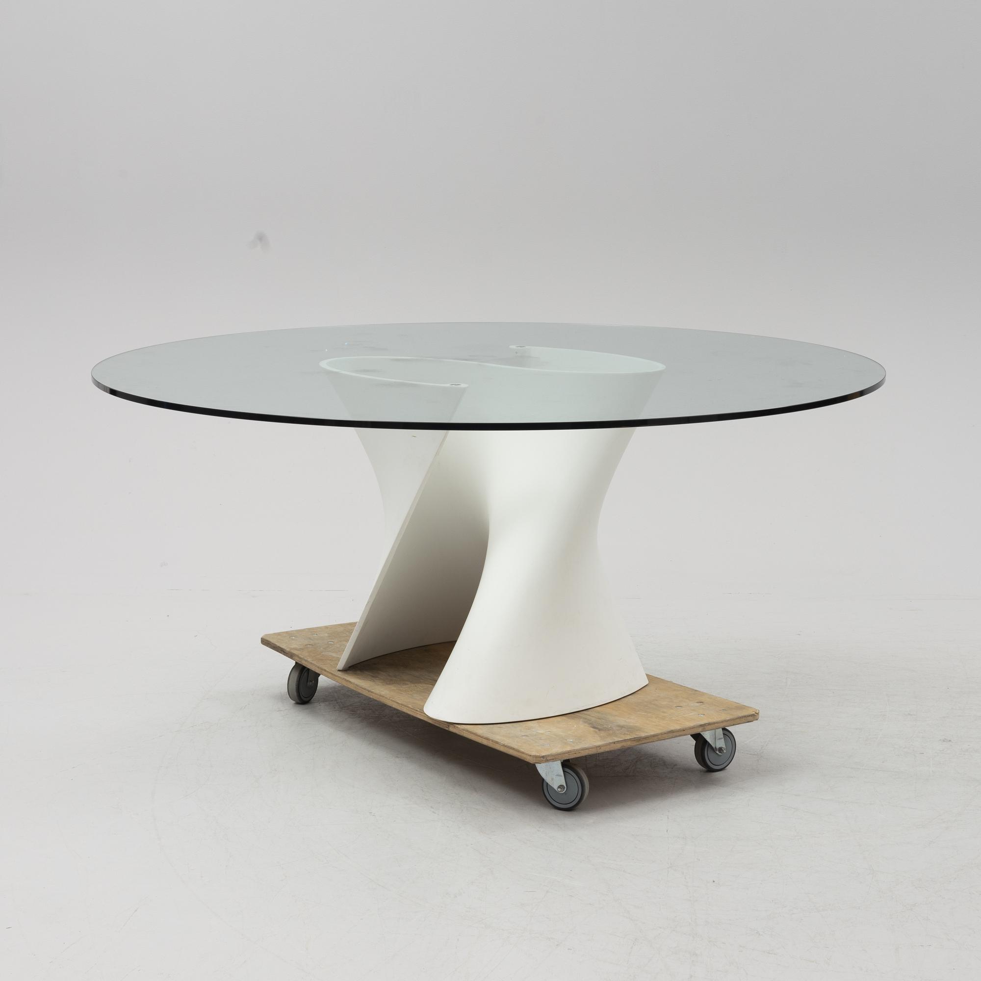 Xavier Lust, a glass top 'S Table' dining table, MDF Italia.