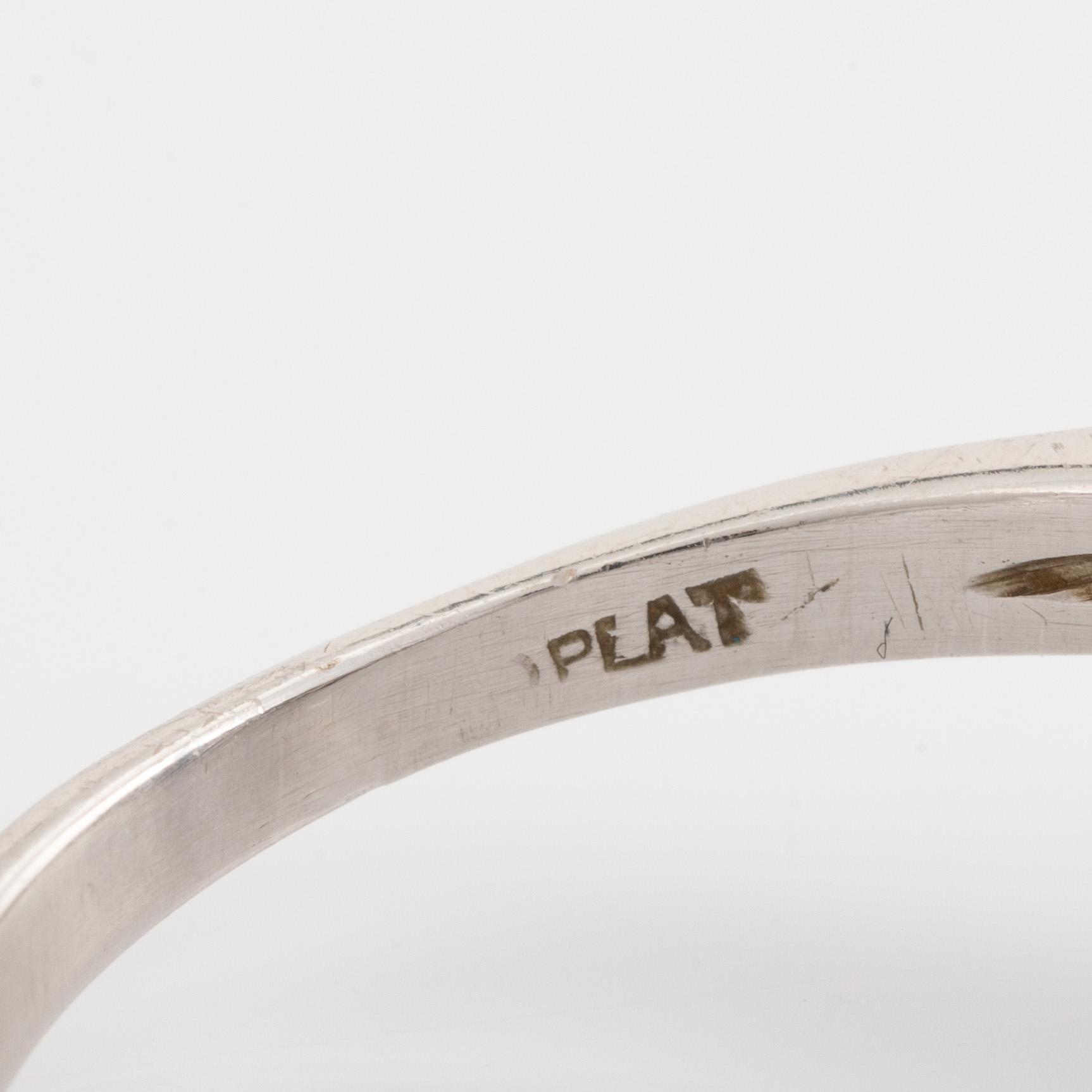 Platinum, brilliant and baguette cut diamond ring.