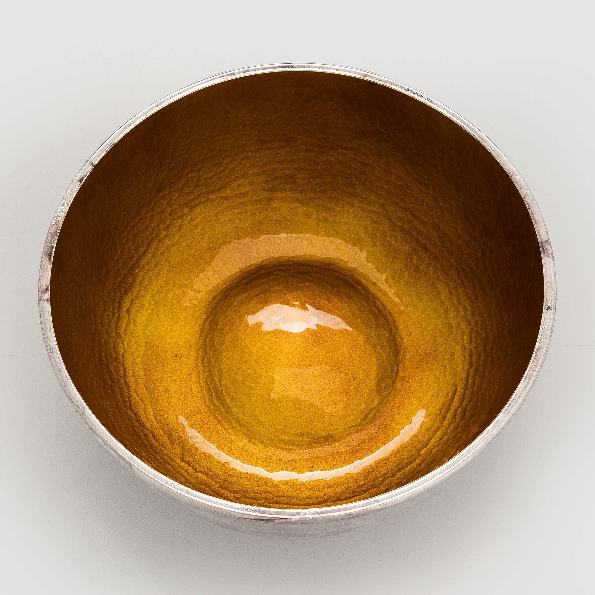 A set of three sterling silver and enamel bowls, maker's mark of A. Tillander, Turku 2005.