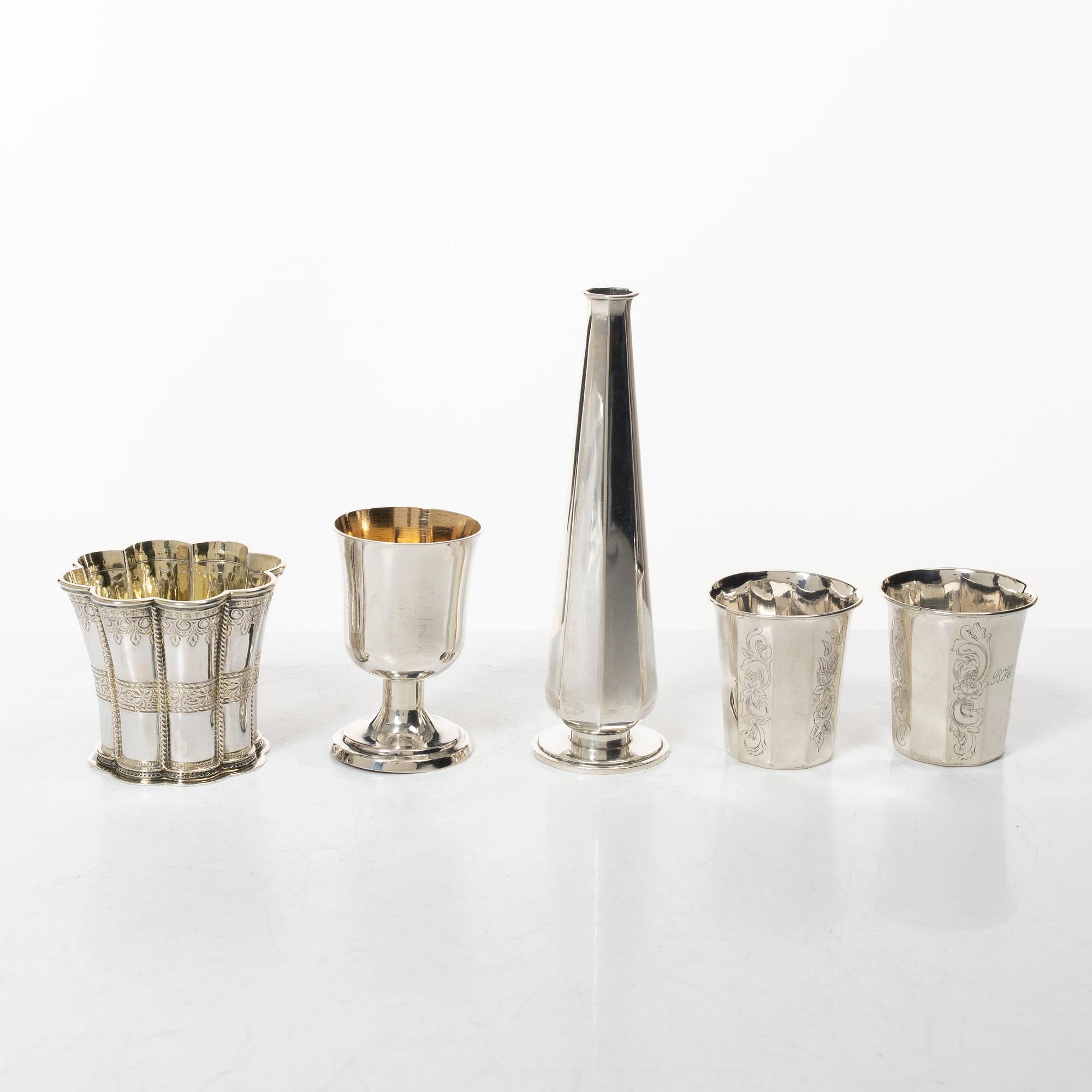 Three silver beakers, a vase and a cup, Sweden and Denmark, 19th-20th century.