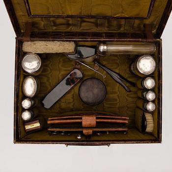 A TRAVEL TOILET CASE, leather, German 1910-20s, boxes with silver lid.