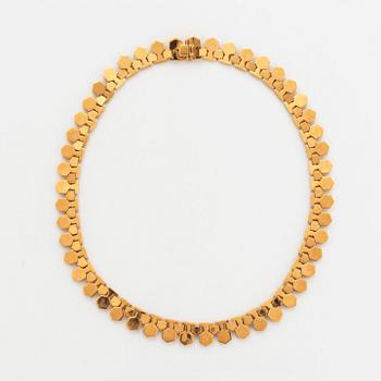 18K gold necklace.