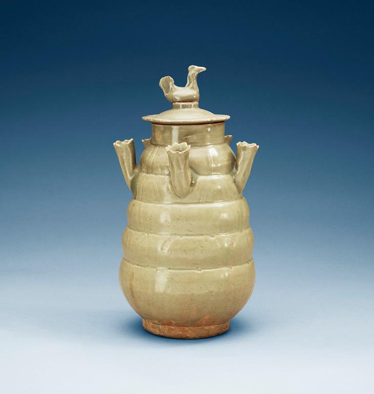 A pale celadon glazed jar with cover, Yuan dynasty.