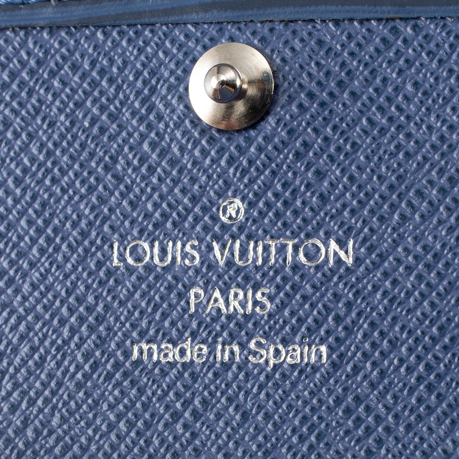 LOUIS VUITTON, a wallet and a key holder.