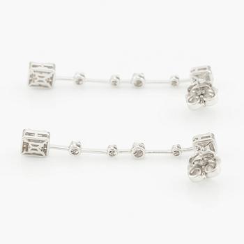 Earrings with baguette and brilliant cut diamonds.