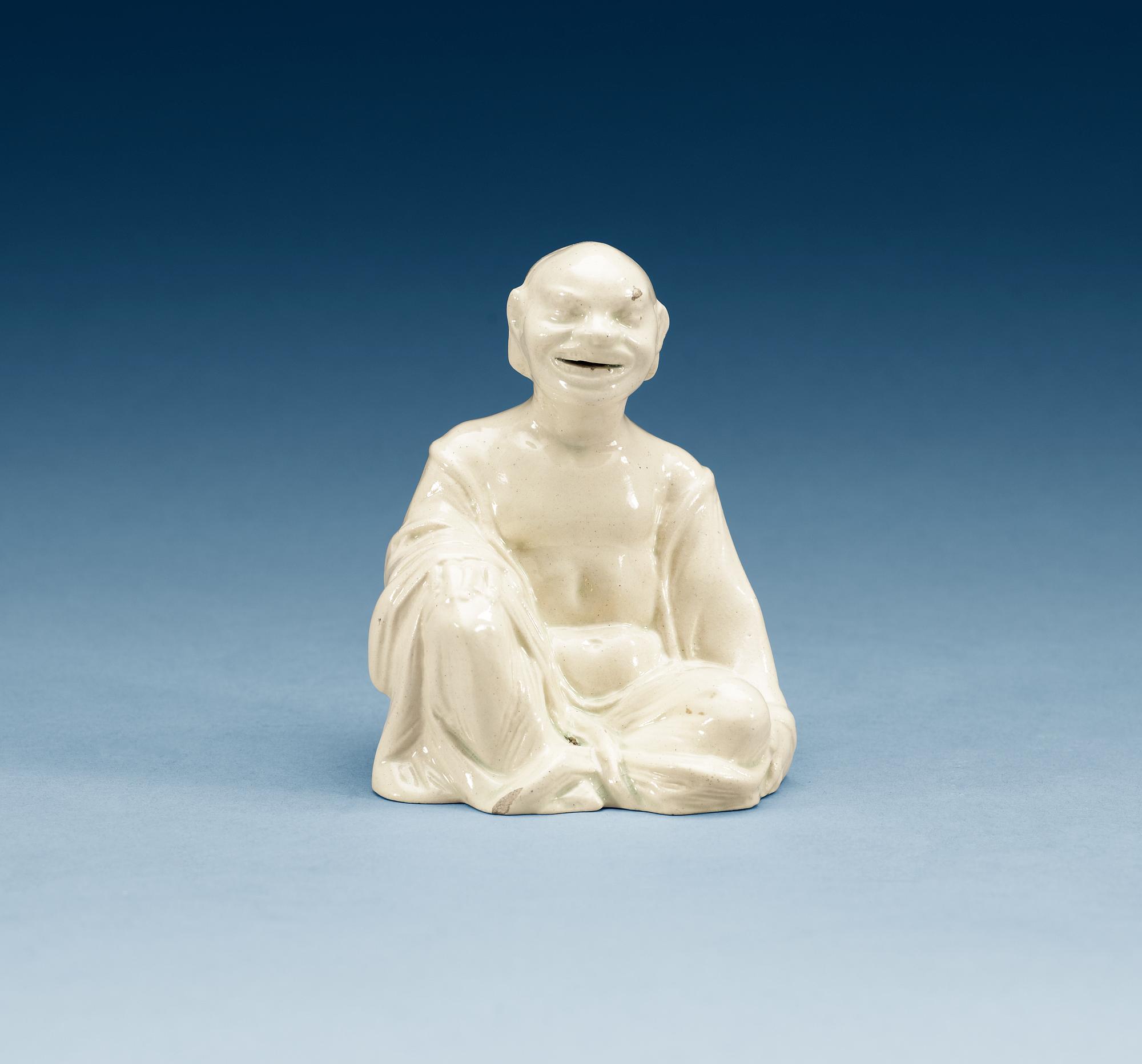 A cream ware 'Pagoda' figure, 19th Century.