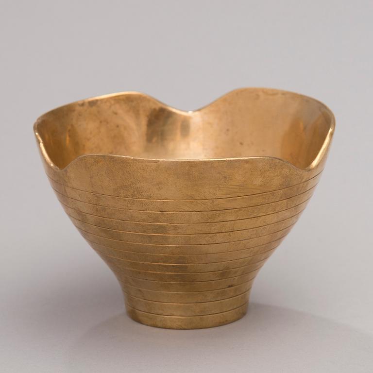 A mid-20th century bronze bowl stamped Oy Taito Ab.