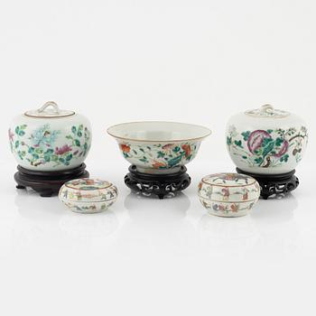 A set of four famille rose boxes with covers and a bowl, late Qing dynasty.
