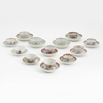 A group of twelve famille rose cups and twelve saucers, Qing dynasty, Qianlong (1736-95).