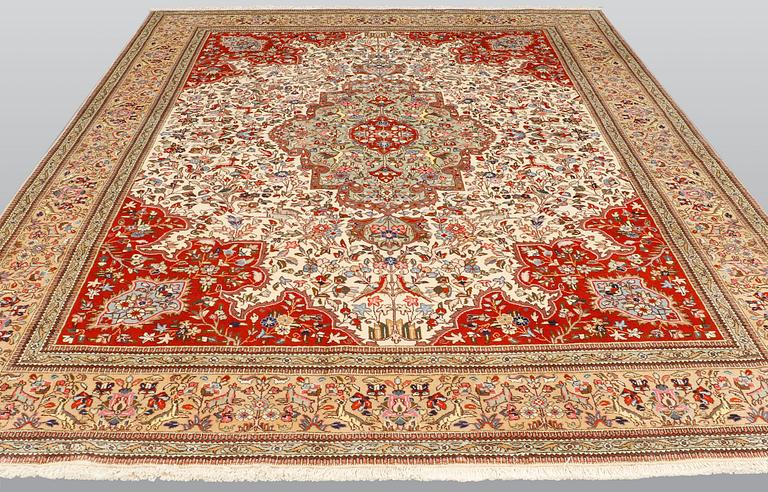 A carpet, Figural Tabriz, so called,  Tabatabai, 380 x 282 cm.