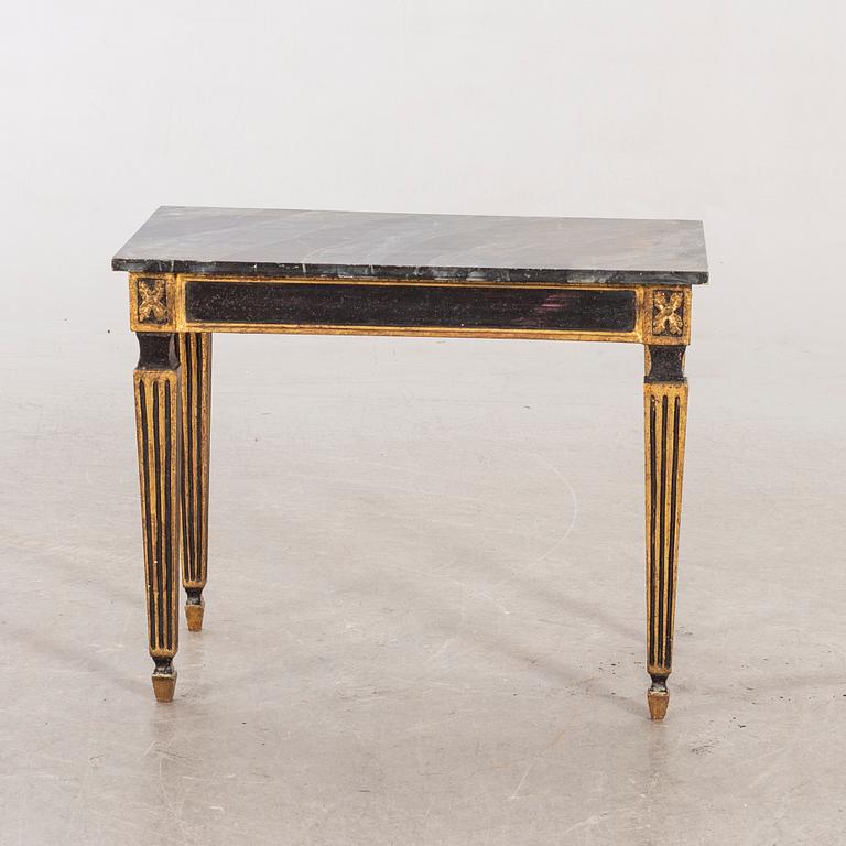 A mid 20th century Louis XVI-styel table from Paoletti, Firenze Italy.