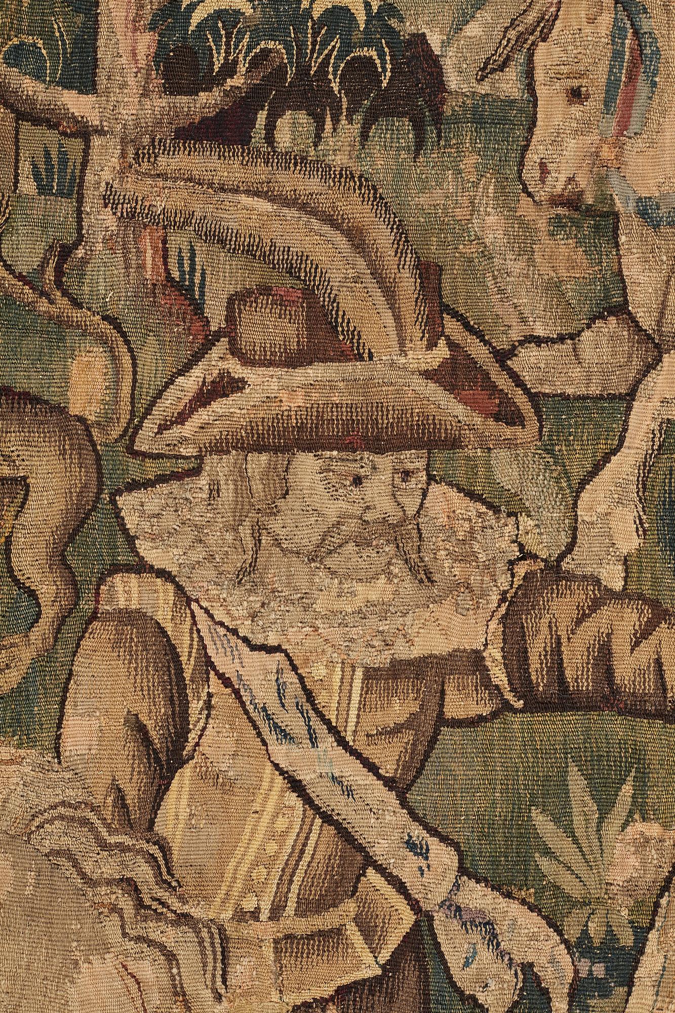 A TAPESTRY, "Lion hunting", tapestry weave, Flanders the middle of the 17th century, possibly Oudenarde, ca 262 x 249 cm.