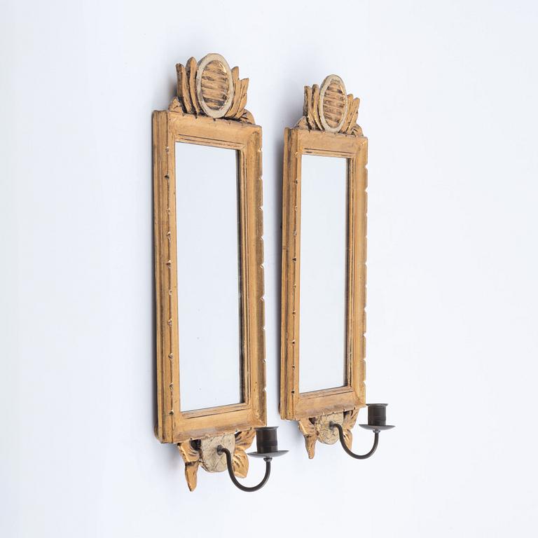 A pair of Gustavian style mirror sconces, early 20th Century.