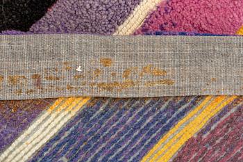 A carpet, 'Océjan', tufted (in relief), Kasthall, Sweden, c. 700 x 170 cm, signed 'JM 83'.