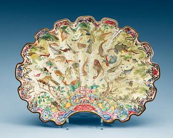 An enamel on copper clam-shaped bowl, Qing dynasty, 18th Century.