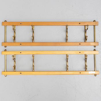 Klädhängare, ett par, "Dekorativ", Skoglunds metallgjuteri, Anderstorp, 1950/60-tal.