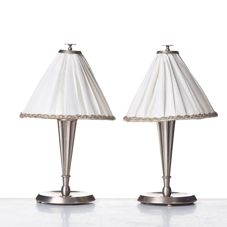 HARALD ELOF NOTINI, a pair of pewter table lamps by Böhlmarks, Stockholm 1920's-30's.