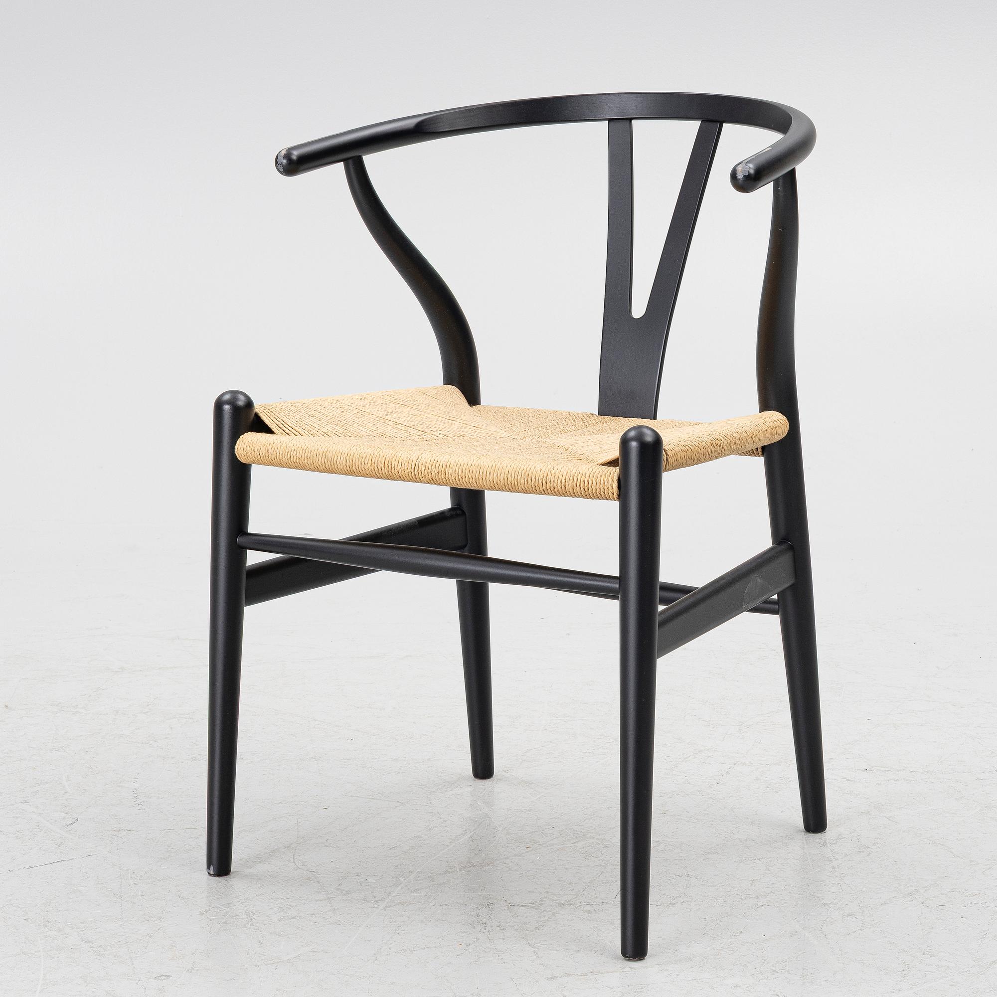 Hans J. Wegner, a model CH-24/'Wishbone' chair, Carl Hansen, Denmark, 21st century.
