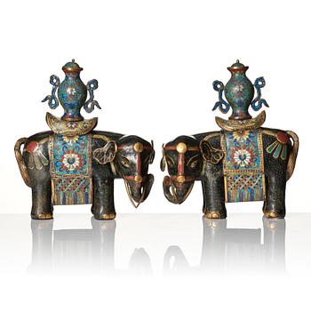 A pair of Chinese cloisonné and chamleve caparisoned elephants, Qing dynasty, 18th/19th Century.