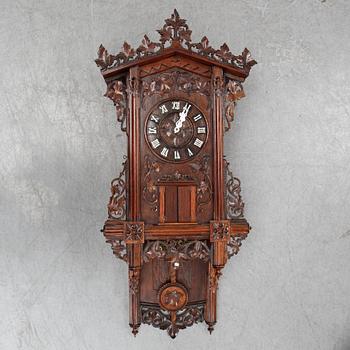 A Schwarzwald area pendulum wall clock by E. Wehrle, late 19th century.