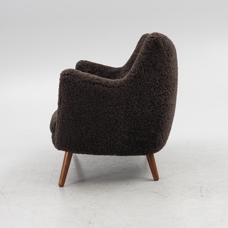 Finn Juhl, a 'Poet' sofa, Niels Vodder, mid 20th Century..