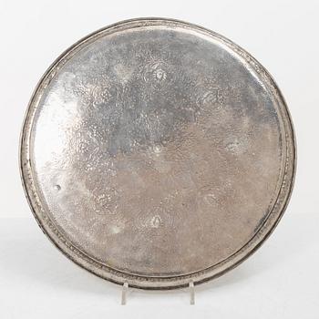 A Persian silver tray, 12 small spoons and six coasters, first part of the 1900s.