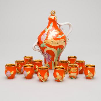 A 13-piece porcelain vodka set by Dulevo, USSR, second half of 20th Century.