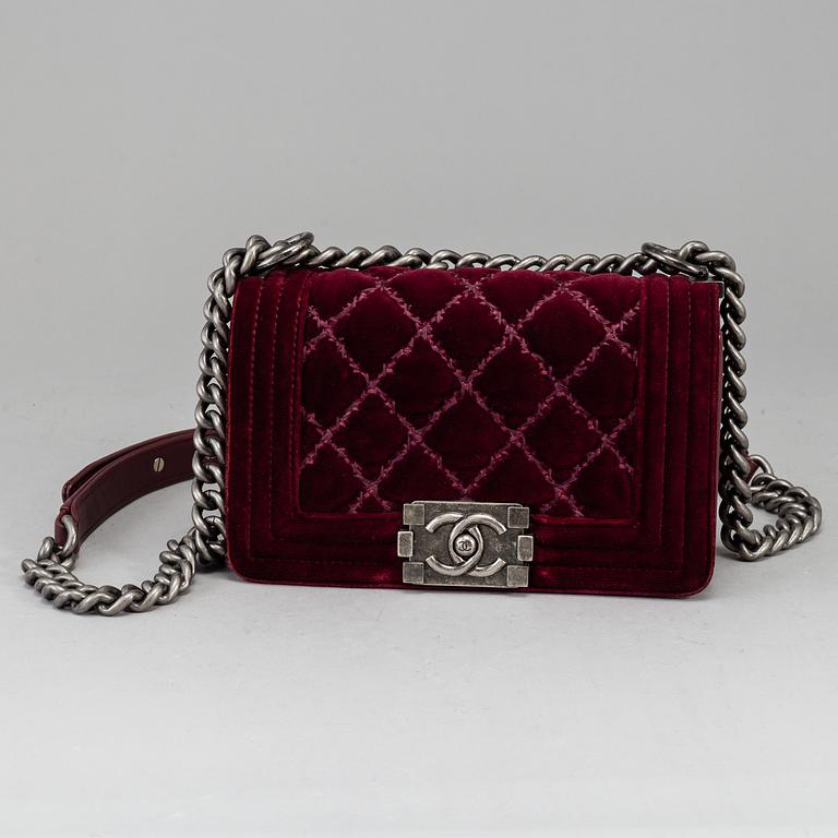 CHANEL, a burgundy quilted velvet 'Small Boy Bag'.