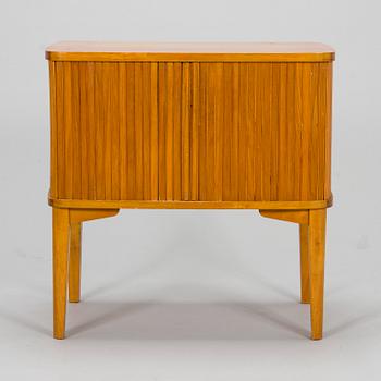 A mid-20th century radio cabinet.