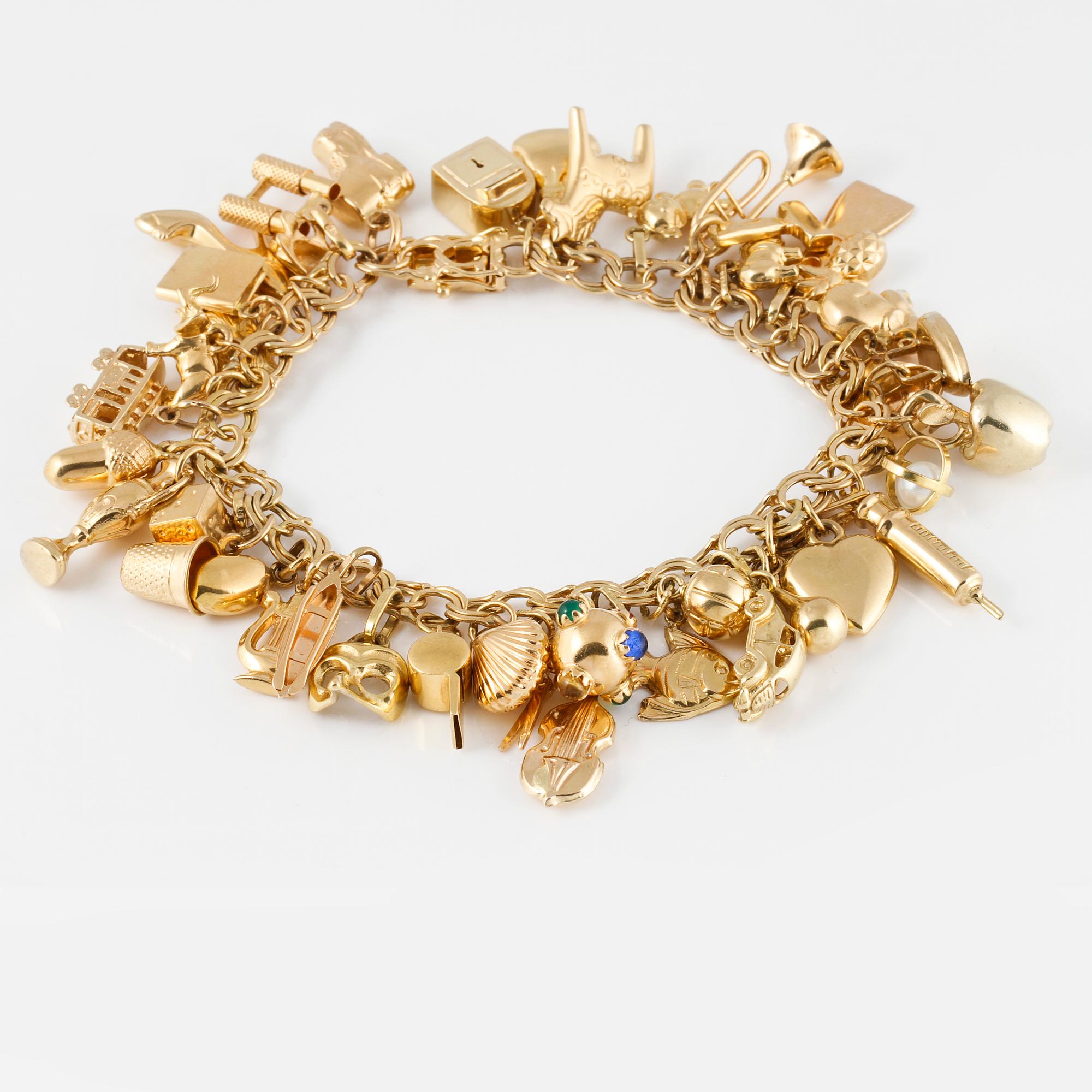 BERLOCKARMBAND, 18K guld, Sture Viberg, Aveta, 1963. Vikt 57,0 gram.