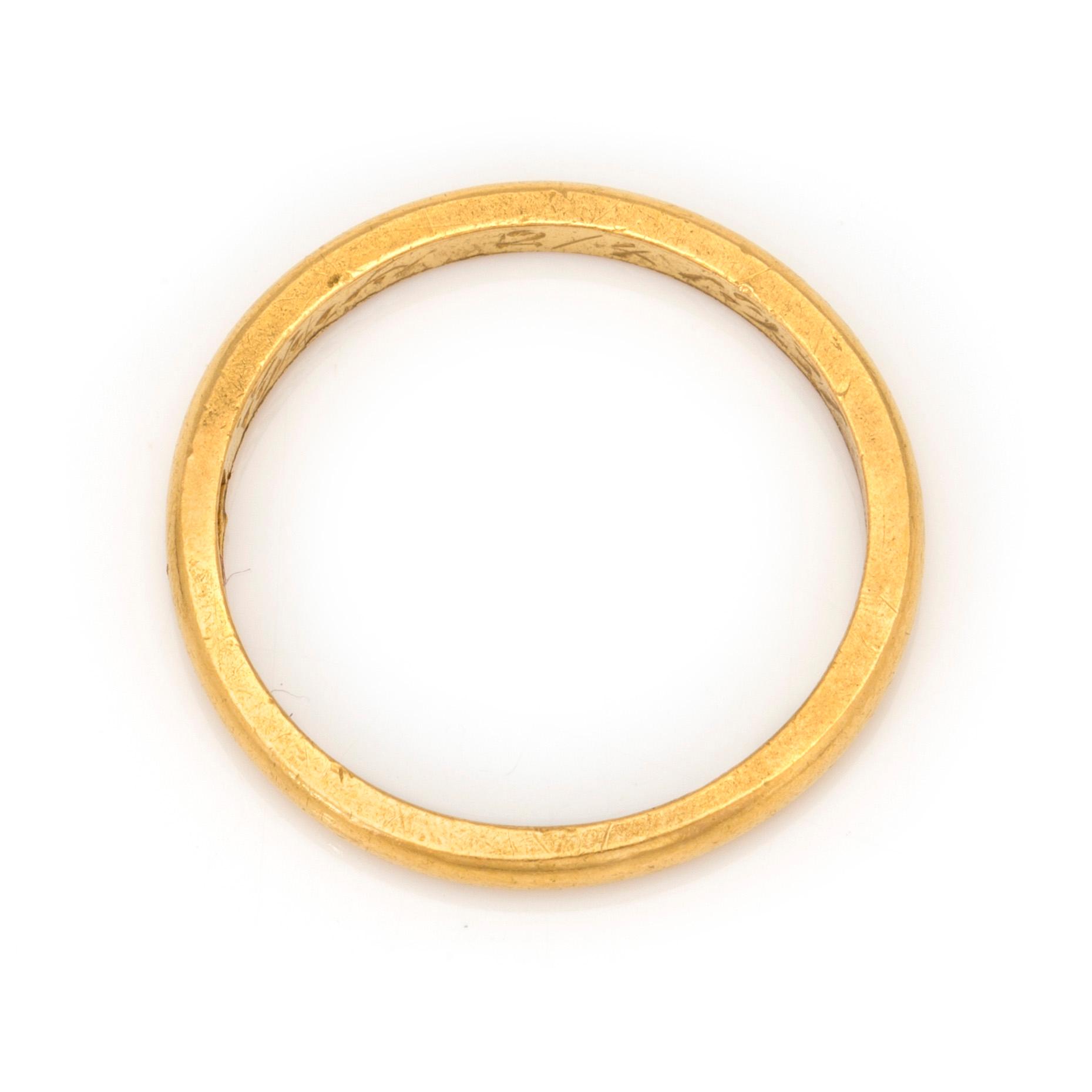 A 23K gold ring.