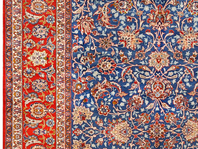 A fine Isfahan carpet of 'Shah-Abbas' design, c 418 x 307 cm.
