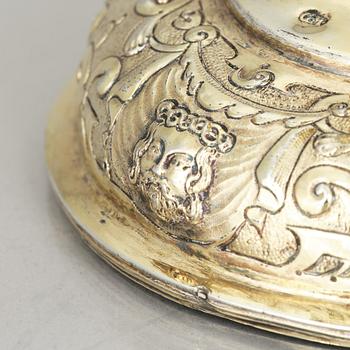 A 17th century silver-gilt cup, marked GM.