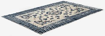 An antique Chinese ' five dragon rug', c. 280 x 190 cm.