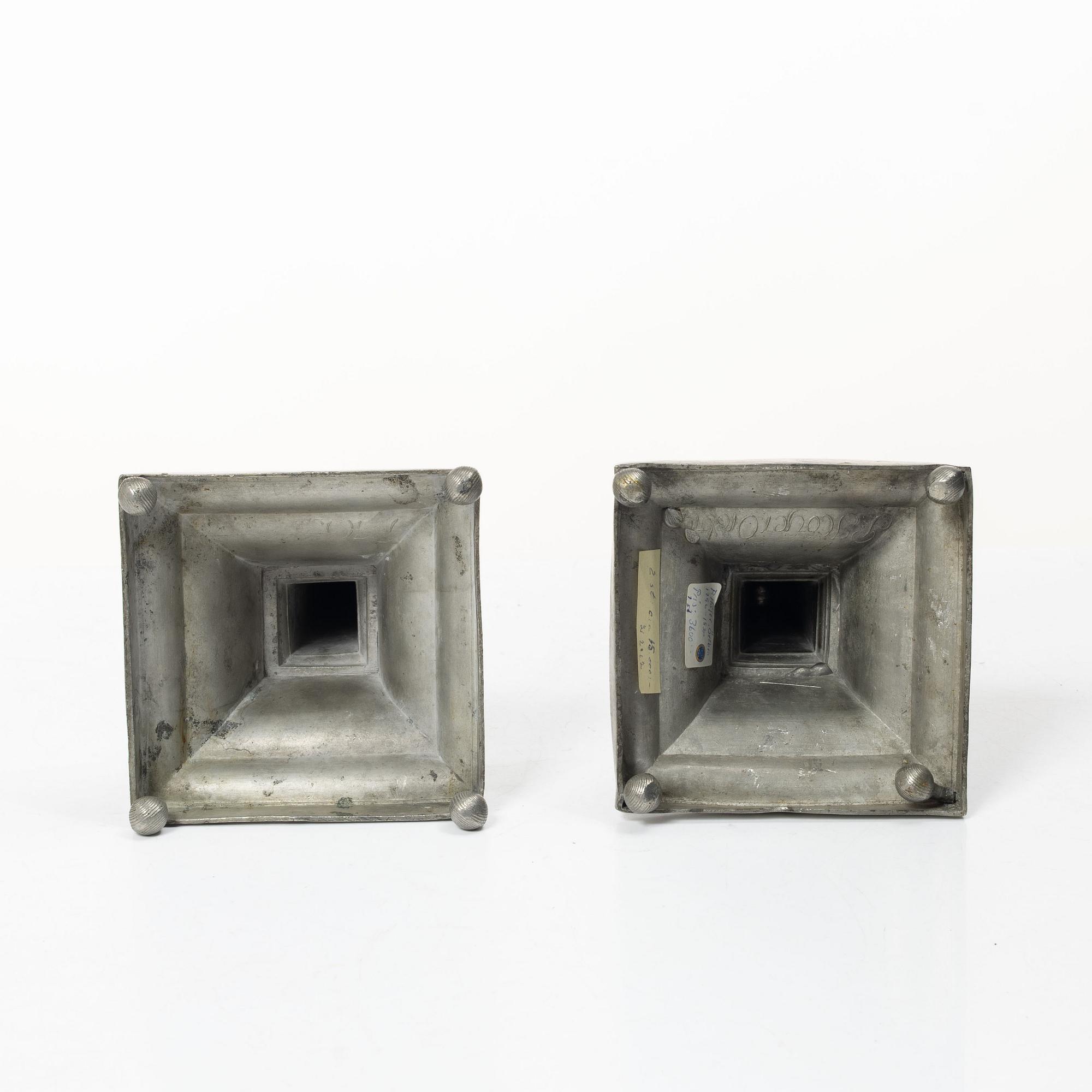 A pair of peuter candlesticks by Petter Höijer, Örebro (1796-1819).