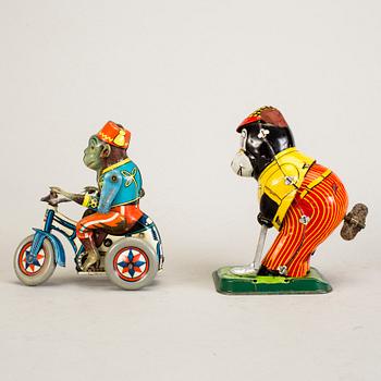 A lot of three tinplate toys Japan and Germany 1950s.