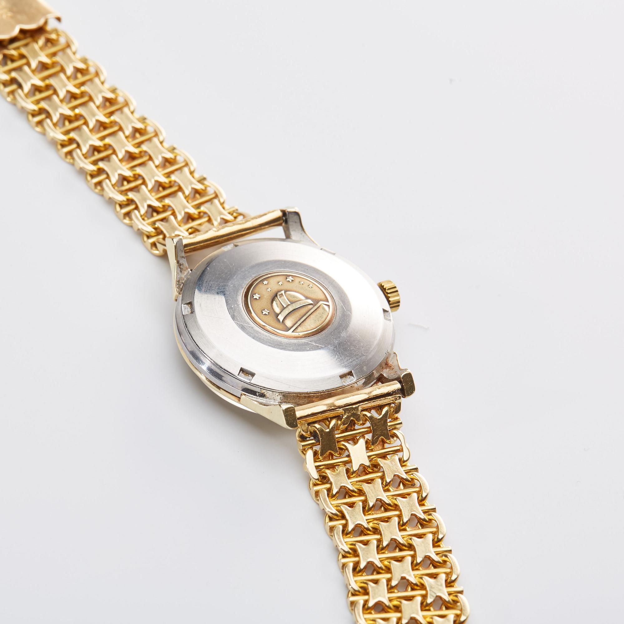 ARMBANDSUR. Omega Constellation, stål, armlänk i 18k guld vikt ca 45 gr. 1960-tal.
